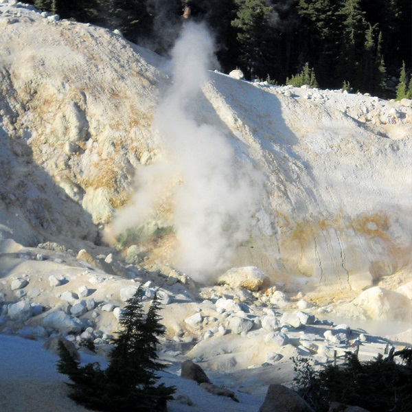 Bumpass Hell is a 16-acre basin of plopping mudpots, bubbling pools, and roaring steam vents, the largest of eight such areas in the park.