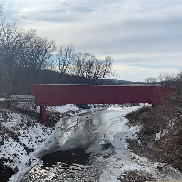 The bridge spans the Middle River, creating a picturesque backdrop for photography and sightseeing. 