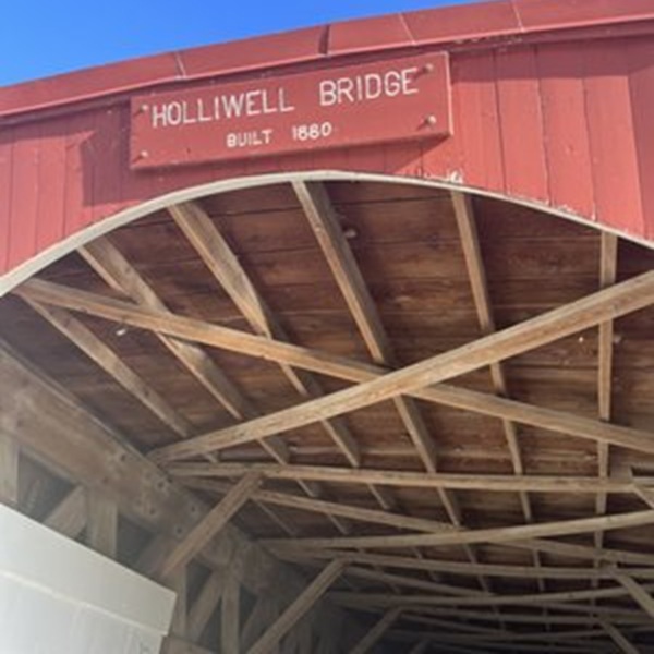 The Holliwell Bridge is part of the Madison County Covered Bridge Scenic Byway, allowing visitors to tour several other historic bridges in the region. 
