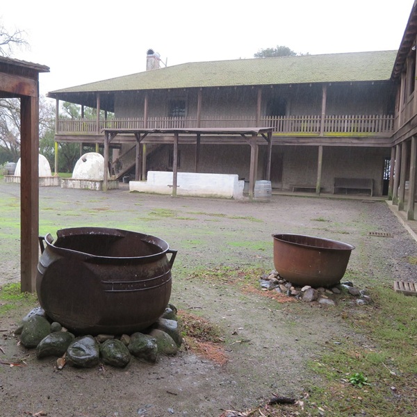 The adobe structure was designed as a two-story fortified compound, surrounding an open central courtyard where livestock, supplies, and daily activities were managed. 