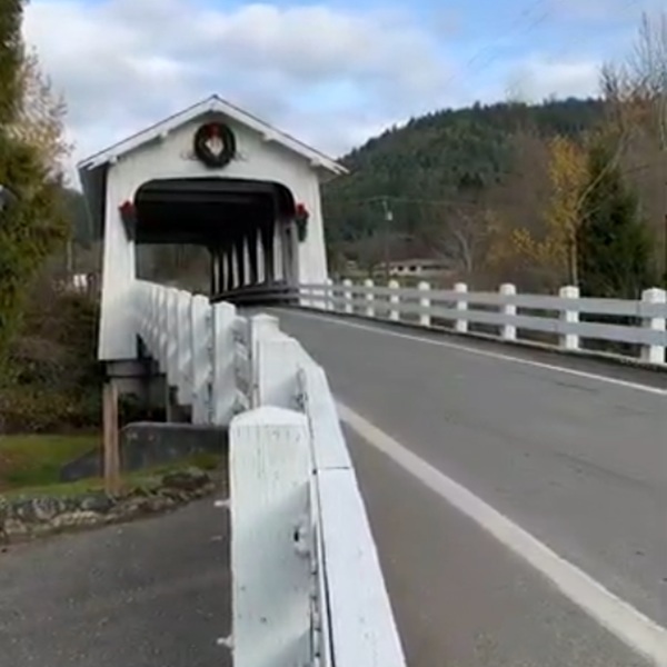 The bridge was originally constructed to carry traffic over Grave Creek as part of Highway 99, the main transportation route in southern Oregon between California and Washington. 