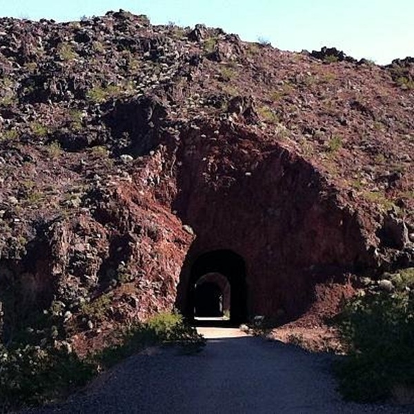 Historic Railroad Hiking Trail offers an easy walk through old rail tunnels with panoramic views of Lake Mead. 