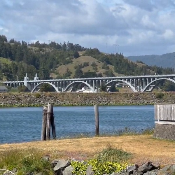 The bridge was designed by famed Oregon bridge engineer Conde B. McCullough, whose decorative coastal bridges became icons of Highway 101 architecture.