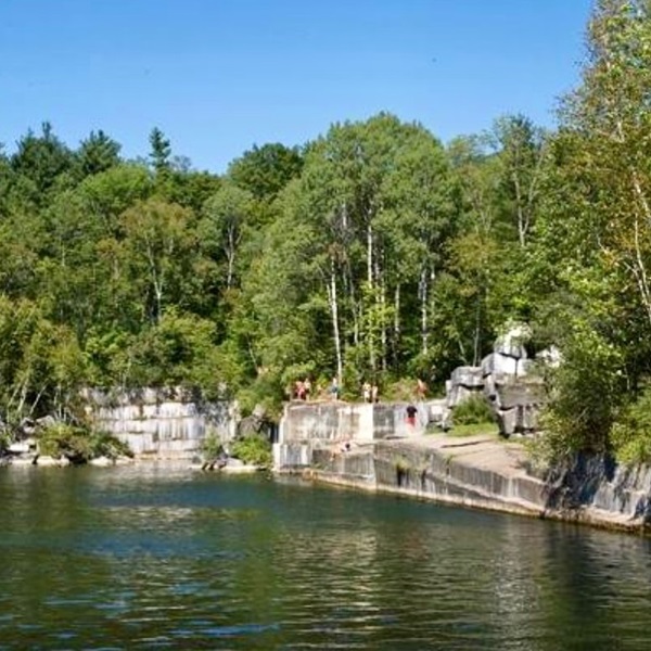The water in the quarry is known for its clarity and deep blue-green color, creating a beautiful and refreshing swimming environment. 