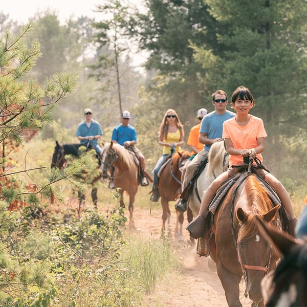 Rocking W Stables offers guided trail rides through the picturesque forests and trails of the Northwoods. 