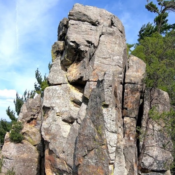 Routes vary in difficulty, with options suitable for both beginners and advanced climbers. 