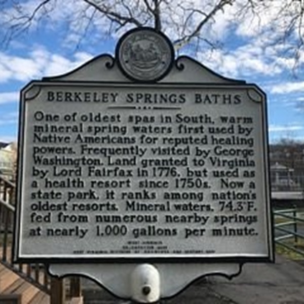 Berkeley Springs State Park is the centerpiece of the town, featuring warm mineral springs that flow at a constant 74.3°F. 