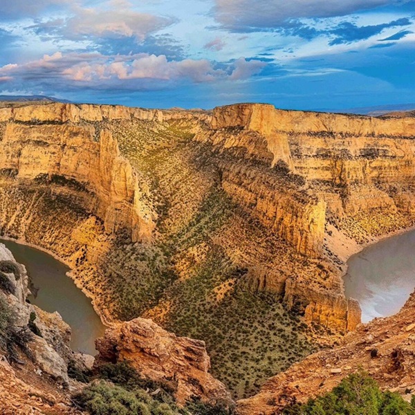 Bighorn Canyon National Recreation Area spans the border between Wyoming and Montana and features dramatic canyon landscapes. 