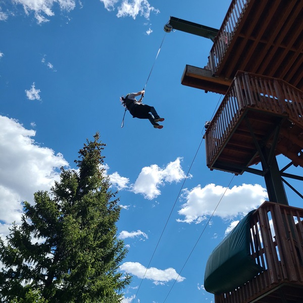 The zipline park features multiple courses with varying lengths and heights, catering to both beginners and experienced zipliners. 