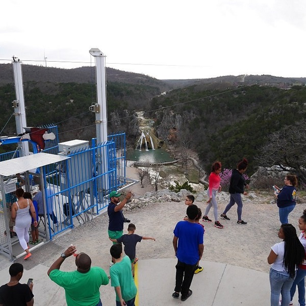 The zipline course includes a variety of lines with different lengths and speeds, catering to both beginners and experienced zipliners. 