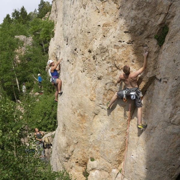 Ten Sleep Canyon, carved by Ten Sleep Creek, is world-renowned for sport climbing, featuring thousands of limestone routes that draw climbers from across the globe. 