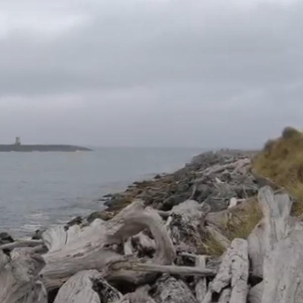 The lighthouse originally stood on an isolated rocky location known as Rackliff Rock. The top of the rock was leveled before construction began. Over time, changes to the shoreline and jetty have altered the setting, and the lighthouse is now connected to the mainland. 