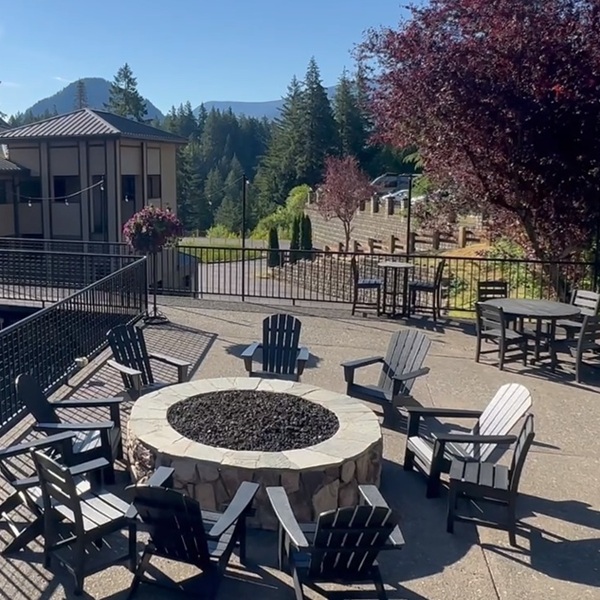 The property features landscaped grounds with mature trees and mountain views where guests can enjoy a peaceful setting away from major urban areas.
