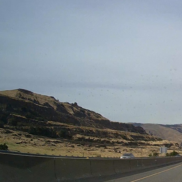 The Columbia River Gorge is a transition zone between western rainforests and eastern dry grasslands, where ancient lava flows, towering basalt cliffs, and the effects of the Ice Age Missoula Floods are visible.