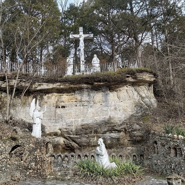 The mosaics depict saints, biblical scenes, and religious figures such as St. Francis, St. Joseph, Jesus in Gethsemane, Our Lady of Sorrows, Assumption, and the Nativity. 