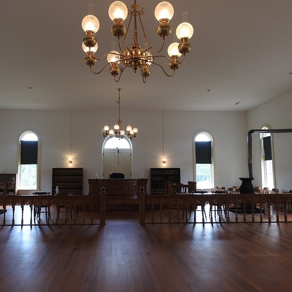 Park docent tours include a stop in a restored courtroom in the Jacksonport Courthouse. 