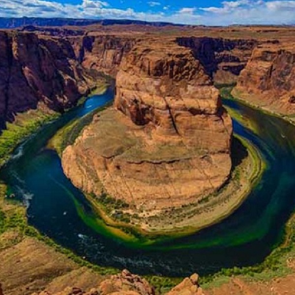 Colorado River meanders at Horseshoe Bend where it runs through the Antelope Canyon. 