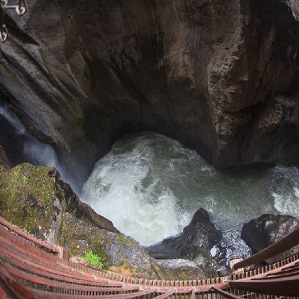 The falls’ plunge pool is surrounded by 80-foot walls. 