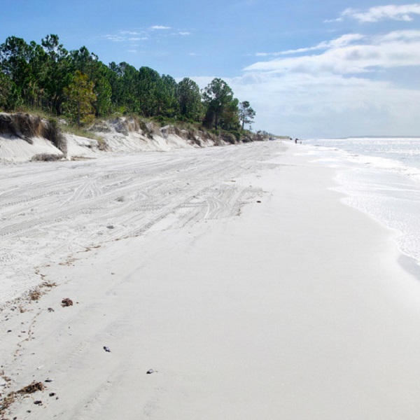 Edged with natural Appalachian quartz beaches and framed by sand dunes as high as 40 feet.