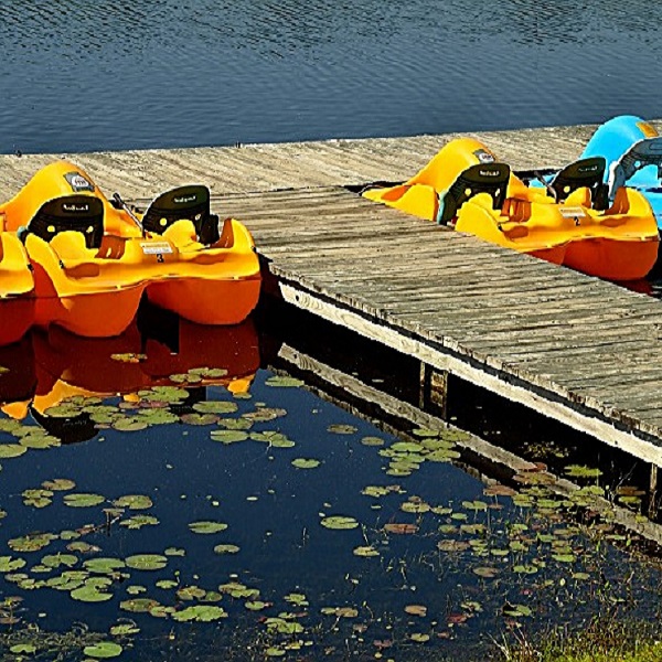 The 12-acre lake offers the opportunity for several activities, including paddleboat rentals. 