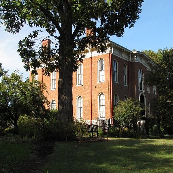 Riverview is an example of classic Italianate architecture with arched windows, deep eaves with ornamental brackets, and the cupola. 