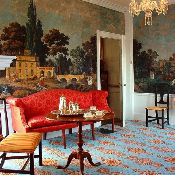 The west parlor is famous for its wallpaper, imported from France and attributed to Dufour. 