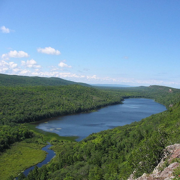 The green of the forests and blue water of its lakes draws summer visitors to the Paradise area.