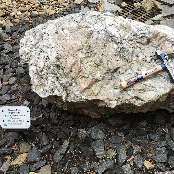 Layers of minerals can be seen in this example of Spruce Pine Pegmatite. 