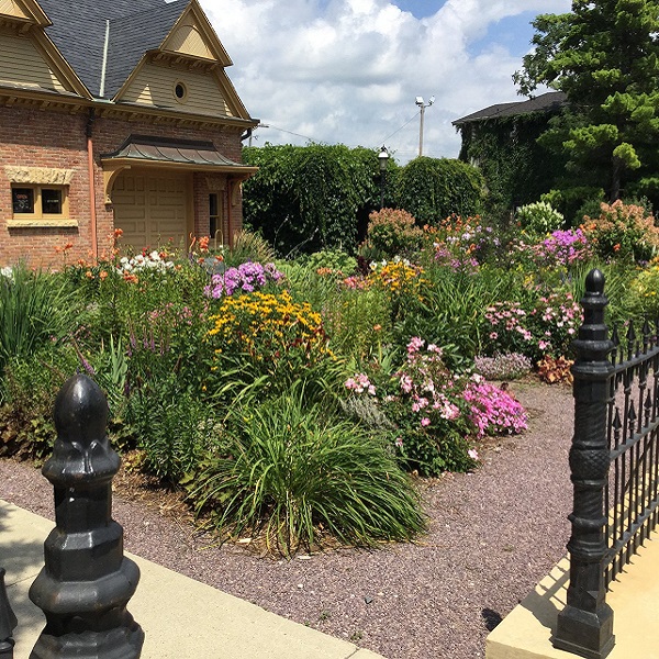 The restoration project brought the home and gardens back to its 1905 appearance. The carriage house displays a 1916 fire engine. 