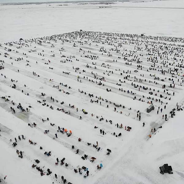 The Devils Lake Volunteer Fire Department annual Ice Fishing Tournament draws thousands to the ice in hopes of catching trophy fish. 