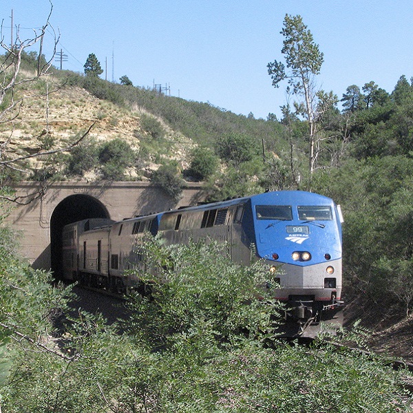 Amtrak serves Raton after passing through a tunnel on the Raton Pass. 