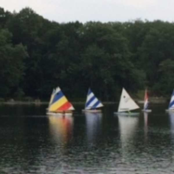 Many visitors and residents spend the summer months on the lake, swimming or sailing. 