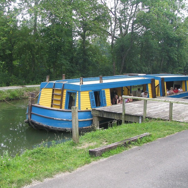 Barge “General Harrison” on the Great Miami Riverway in the Piqua. The canal is wide enough to permit two barges to pass. 