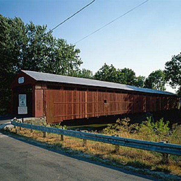 This historic covered bridge spans the Great Miami River in Miami County north of Troy. 
