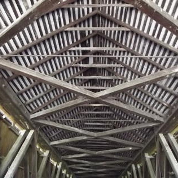 The Miller Covered Bridge is a covered Smith through truss design. 