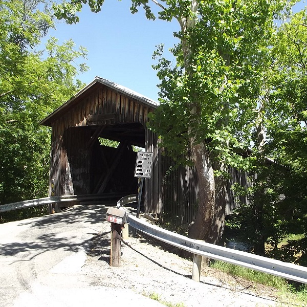 The historic North Pole Covered Bridge crosses Eagle Creek with a total length of 166 feet. 