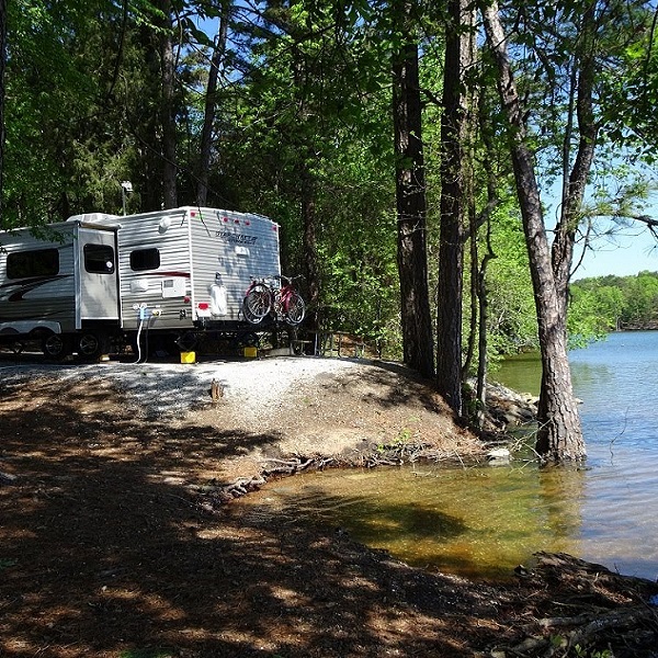 Camping at Dreher Island State Park includes RV sites right on the shore of Murray Lake. 