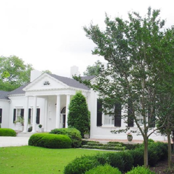 Whitehall is an example of a Georgian Revival home, with gabled roofs on all three sections. 