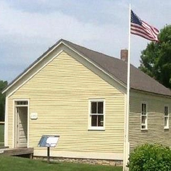 The historic 1815 Log Schoolhouse is home of the Colchester Historical Society. 