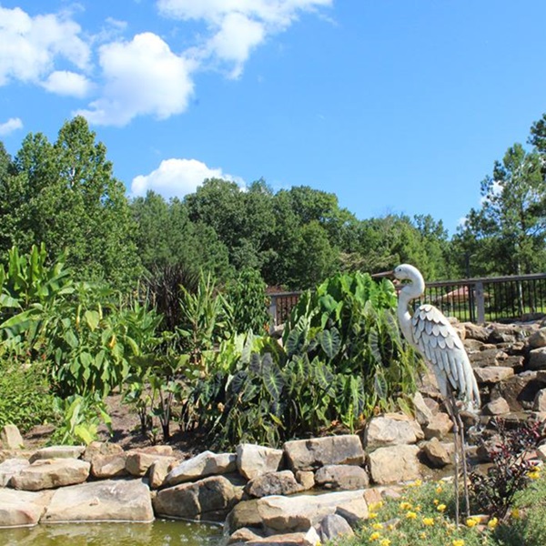 The Japanese Garden, inspired by the Zen tradition, offers tranquil koi ponds, graceful bridges, and meticulously manicured bonsai trees.