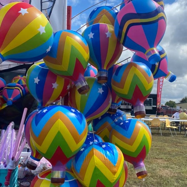 The Arkansas Hot Air Balloon Championship takes place against the stunning backdrop of the Ozark Mountains. 
