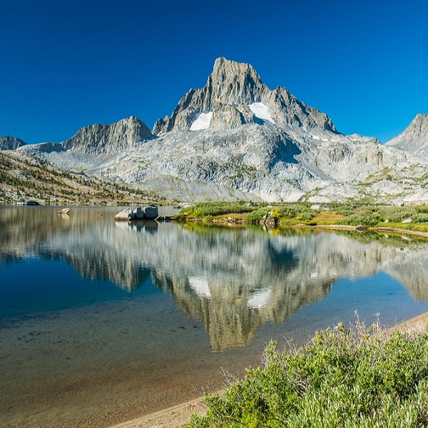 The JMT passes through Tuolumne Meadows, a common resupply stop, before heading to Donahue Pass at 11,066-foot elevation. 