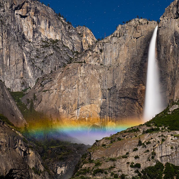 A rare “moonbow” forms as lunar light hits the falls on a clear spring evening. 