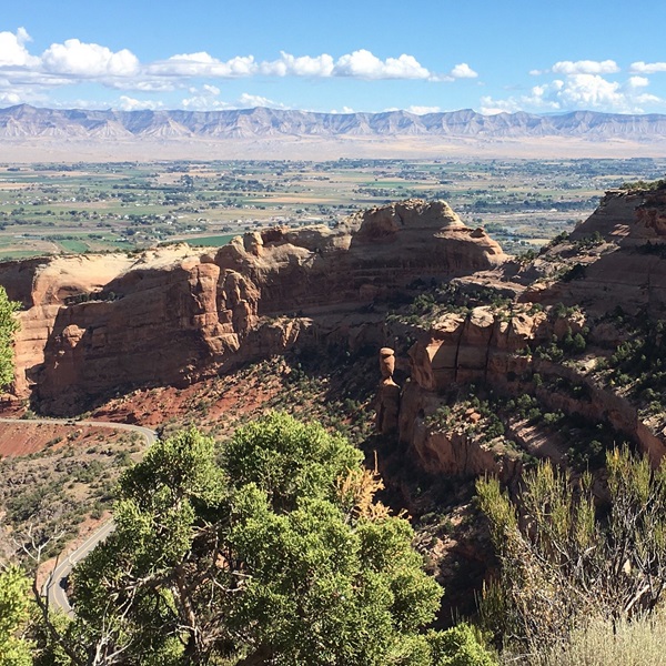 Colorado National Monument is a mini-Grand Canyon boasting towering red rock canyons. Drive or hike the Rim Rock Drive for breathtaking panoramas. 