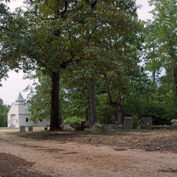 There was a fourth “death mask” headstone that was located near the wife’s marker. It was the largest of Nettles’ headstones, a life-sized, from-the-hip-up figure of his mother, Selena. 