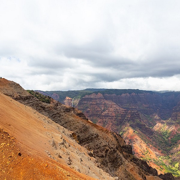 Waimea Canyon was formed over millions of years by the erosive forces of water and lava flows from nearby Mount Waialeale, one of the wettest places on Earth. 
