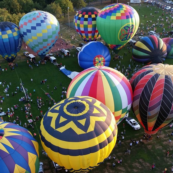 Visitors enjoy live music, delicious food vendors, a classic car show, a kids' area with inflatables and games, and a fireworks display to end the night. 
