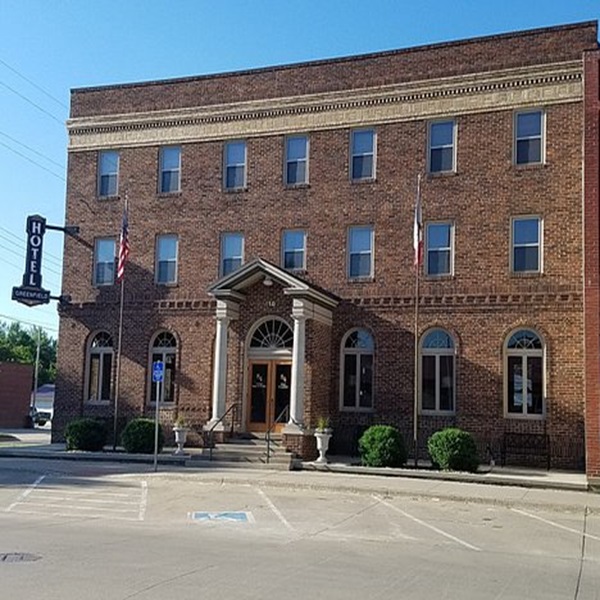 Built in 1919, the Hotel Greenfield started out with 15 rooms and one shared bath on each floor. Renovated, the front desk in the lobby is still the same as it was originally.