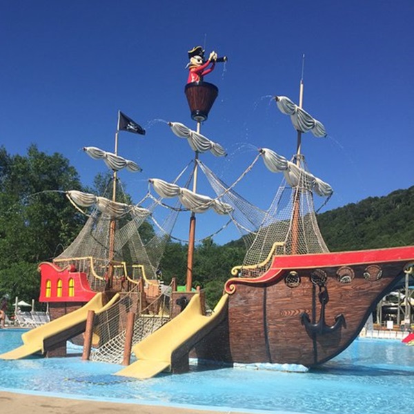 The Land of Make Believe subtly integrates educational elements through interactive exhibits and historical characters. 