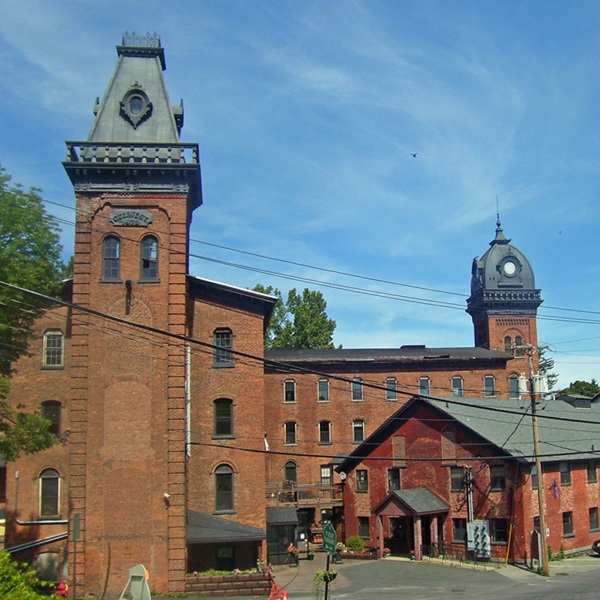 Originally built to harness the nearby creek for textile production, the West Mill site was converted to paper bag production and later became a chocolate factory.